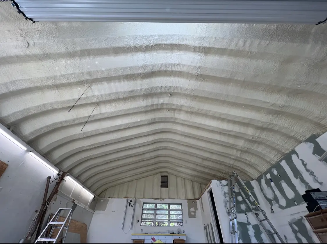 Spray polyurethane foam applied to the underside of a metal roof deck in Old Lyme